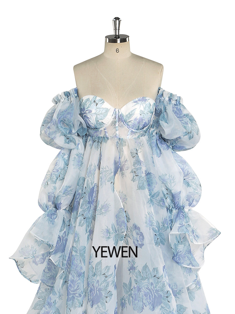 Close-up of floral print silk organza fabric on maternity dress designed for photoshoot and baby shower photography