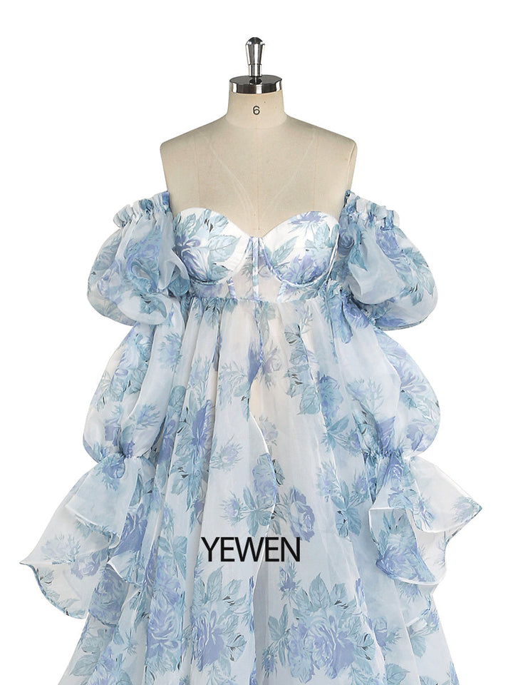 Close-up of floral print silk organza fabric on maternity dress designed for photoshoot and baby shower photography