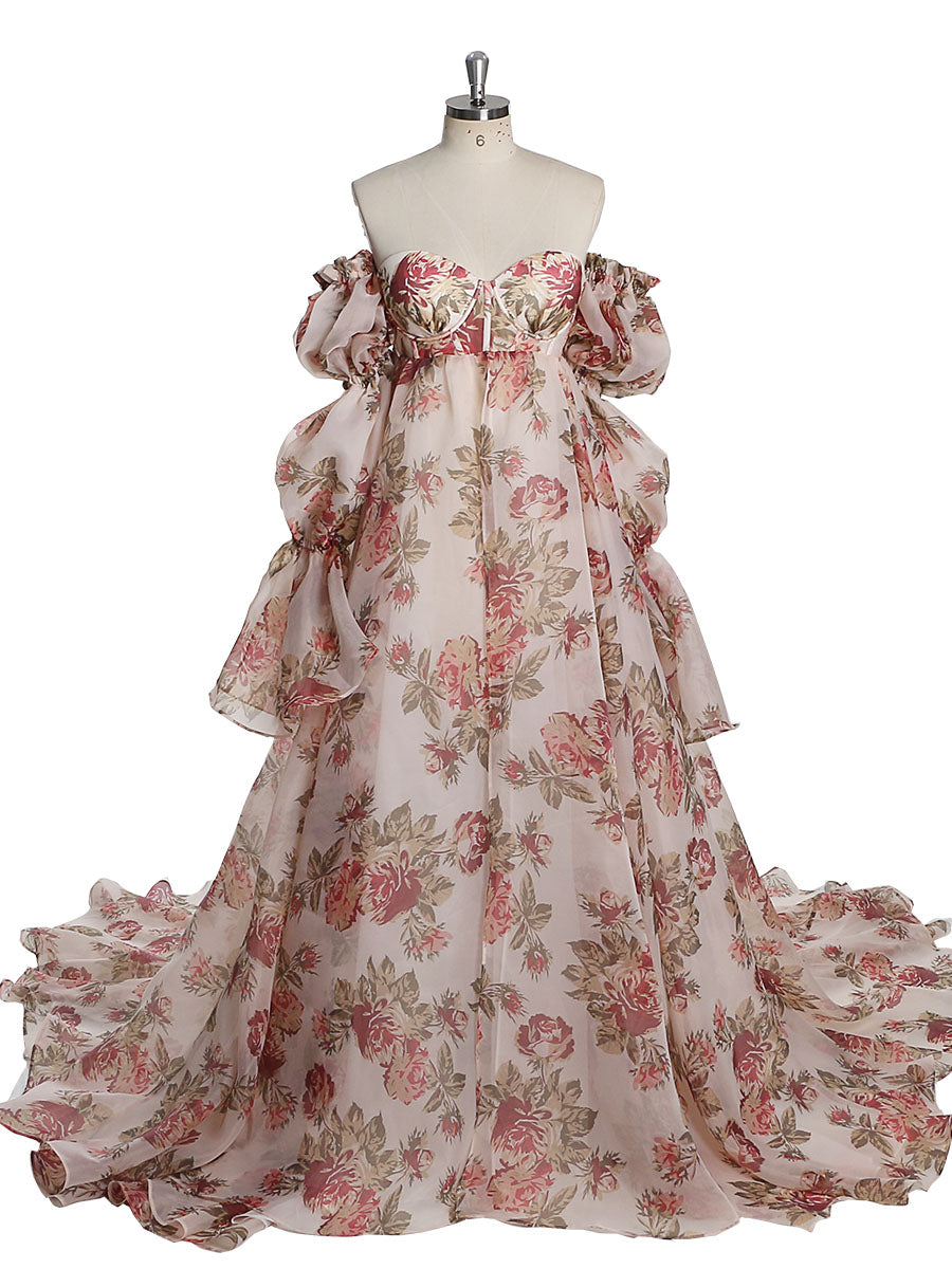 Front view of red floral maternity dress for photoshoot with silk organza fabric and elegant flowing silhouette