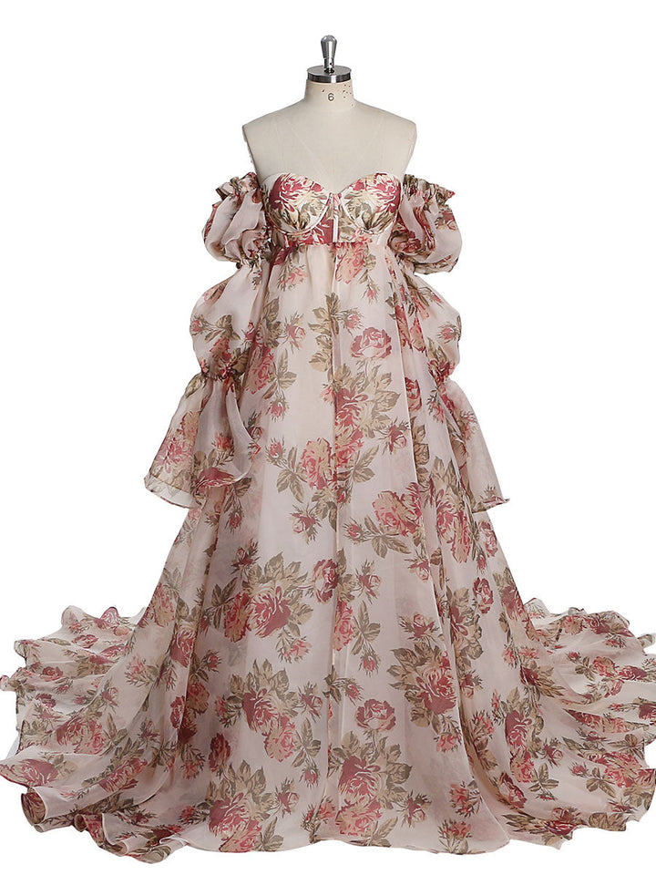 Front view of red floral maternity dress for photoshoot with silk organza fabric and elegant flowing silhouette