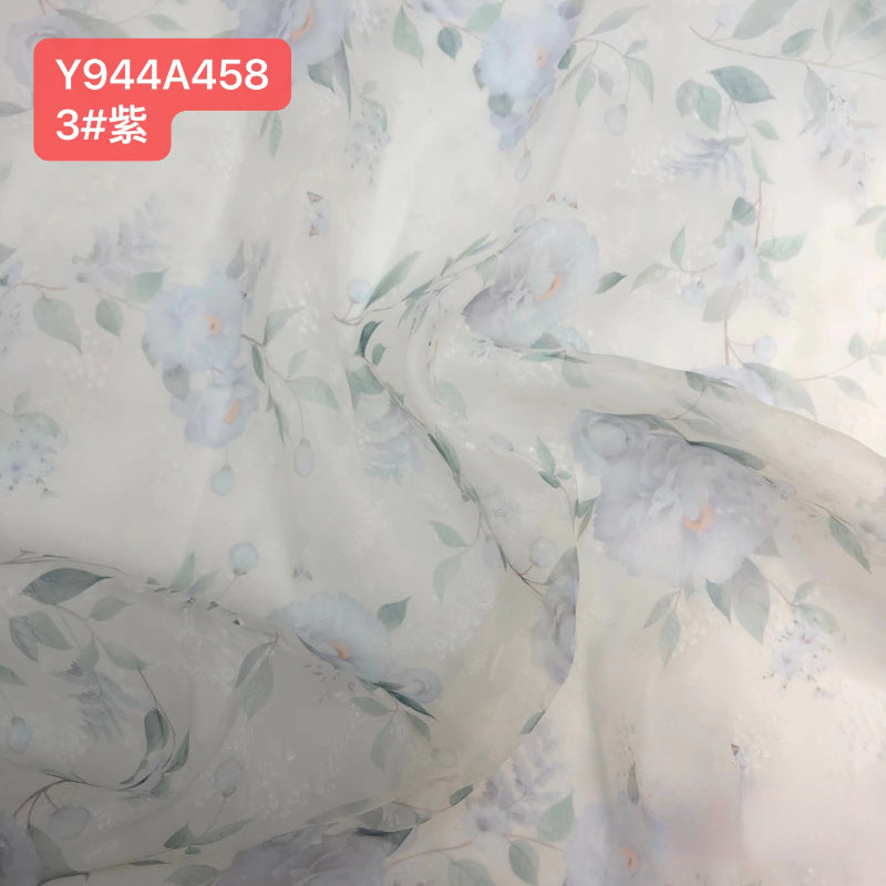Custom purple for romantic floral maternity photoshoot dress styled for editorial pregnancy photography with soft organza flowers