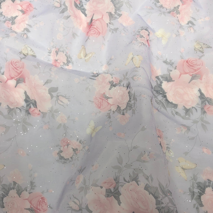 Custom color of handmade organza flower details on a floral maternity photoshoot dress