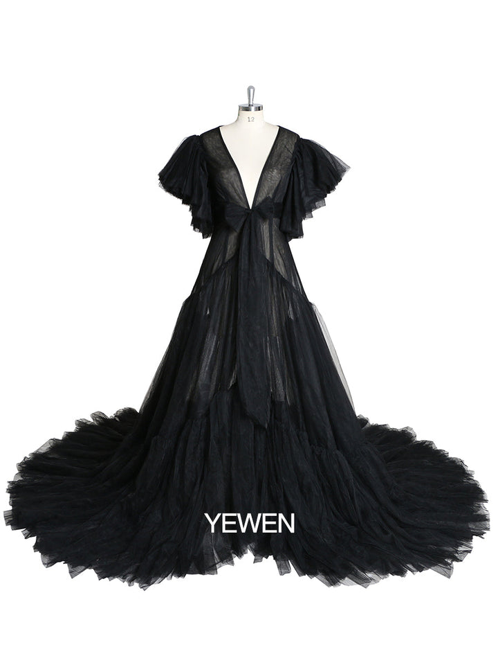 Back view of black V-neck bow maternity dress designed for baby shower and photo shoot styling