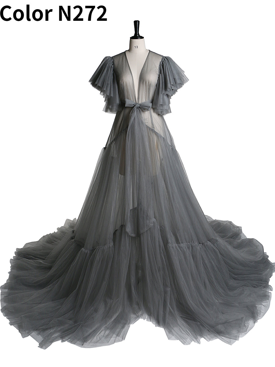 Front view of grey maternity dress for photo shoot featuring V-neck design, bow detail, and short sleeves