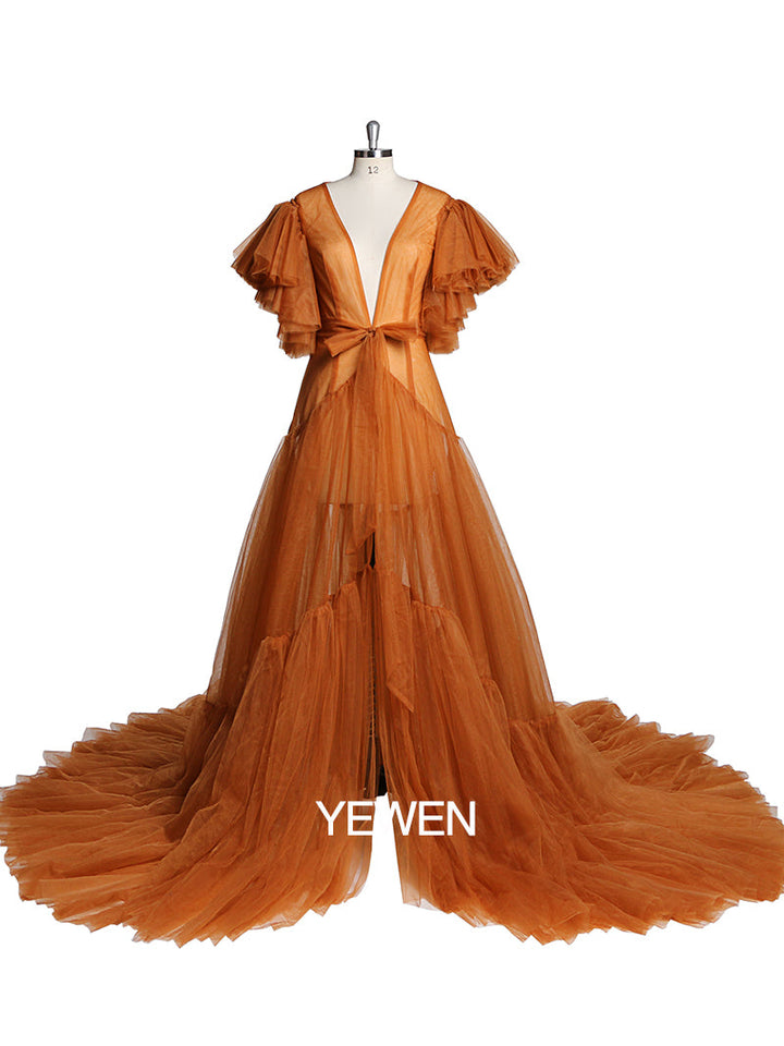Front view of maternity dress for photo shoot featuring V-neck design, bow detail, and short sleeves
