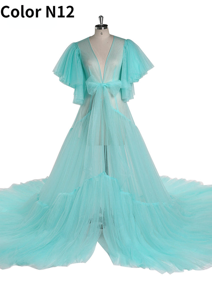 Elegant maternity dress for photo shoot styled in soft light for romantic pregnancy photography