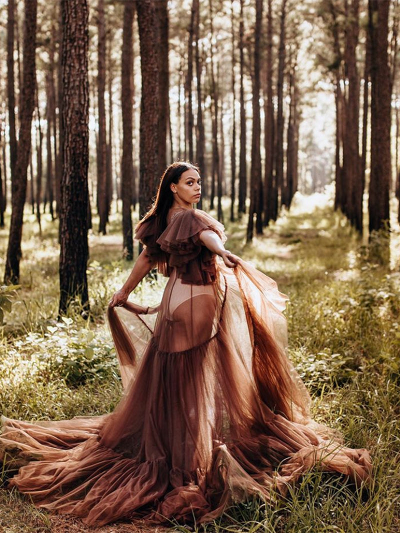 Elegant maternity dress for photo shoot styled in soft light for romantic pregnancy photography