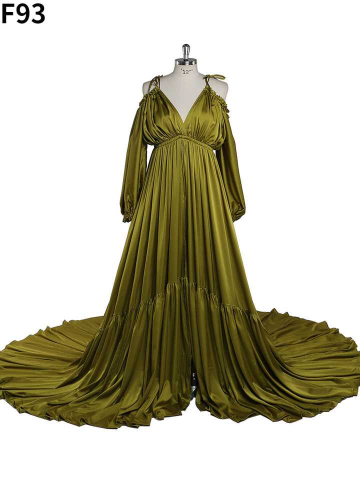 Front view of green shoulderless maternity photoshoot dress with elegant sexy evening maxi silhouette