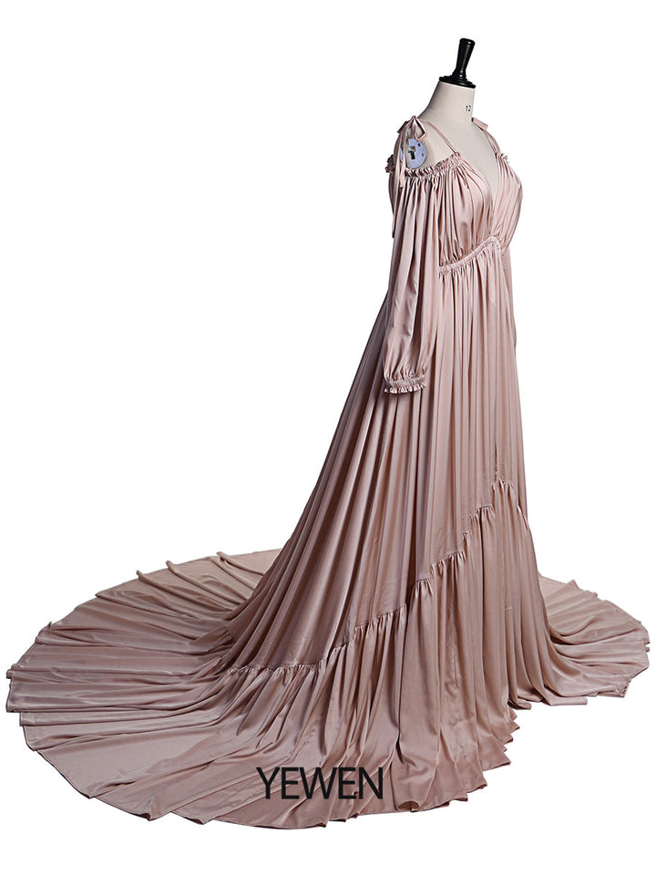 Side view of shoulderless maternity photoshoot dress showing flowing elegant maxi gown for photography