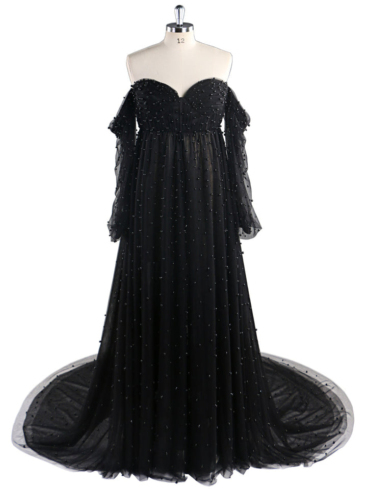 Front view of black maternity photoshoot gown with open front design and elegant pearl detailing