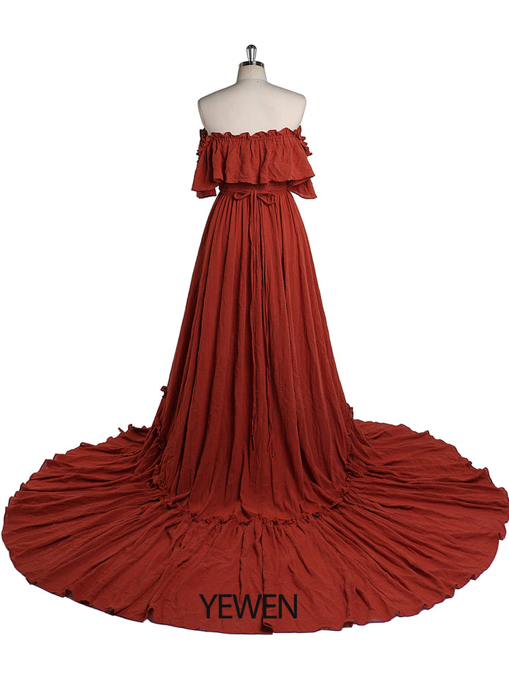Back view of burgundy off shoulder maternity dress for photo shoot designed for elegant baby shower photography