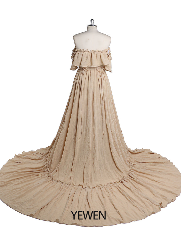 Back view of kahaki off shoulder maternity dress for photo shoot designed for elegant baby shower photography