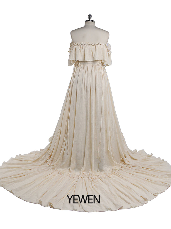 Back view of off shoulder maternity dress for photo shoot designed for elegant baby shower photography