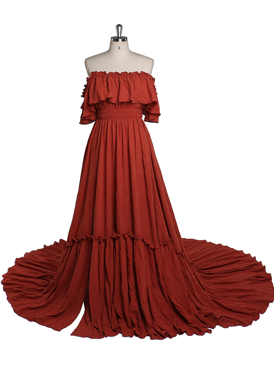 Front view of burgundy off shoulder maternity dress for photo shoot with adjustable waist and elegant maxi silhouette