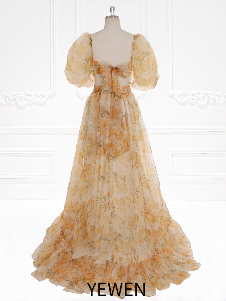 Back view of photoshoot dress featuring a two-piece design and elegant floral gown silhouette