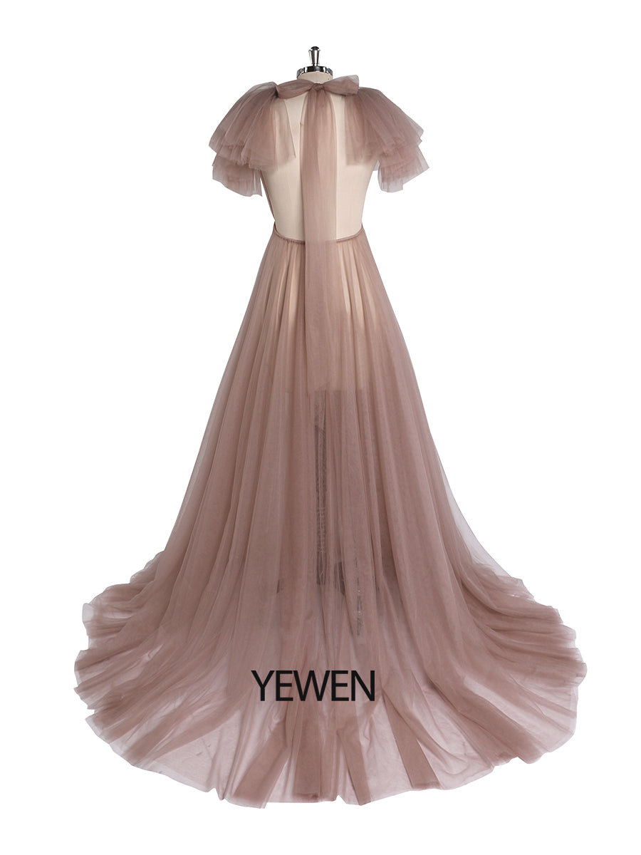 Back view of pink maternity dress for photo shoot with tulle flowers and long flowing silhouette