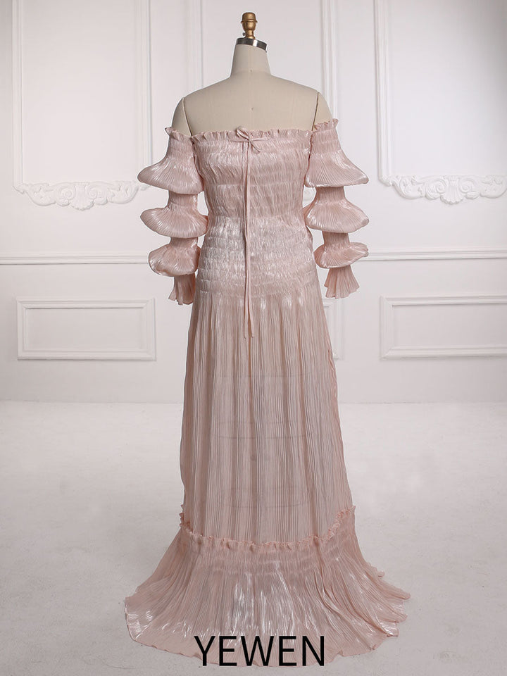 Back view of pleated maternity dress featuring long sleeves and elegant details for photo sessions
