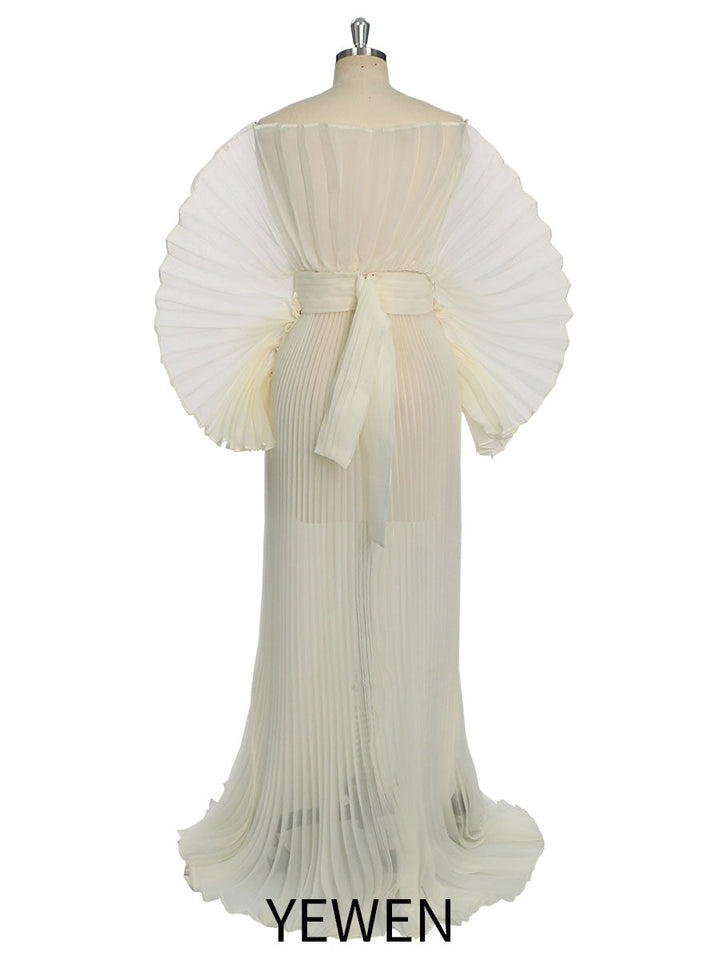 Back view of pleated maternity photoshoot dress made with organza fabric for elegant photoshoot styling