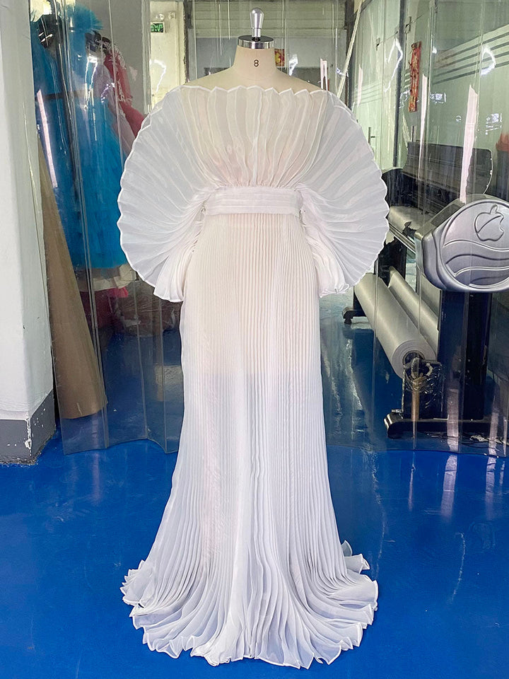 Elegant off white organza pleated maternity photoshoot dress designed for luxury pregnancy photography and baby shower sessions