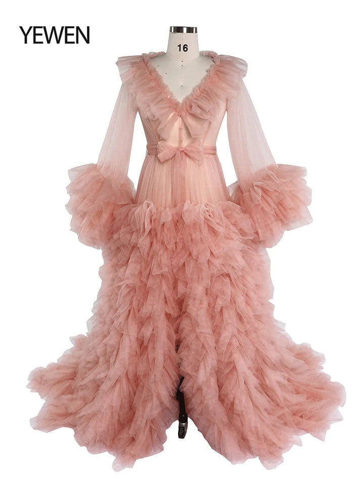 Front view of pink ruffled maternity dress for photo shoot featuring champagne color, V-neck design, and elegant silhouette