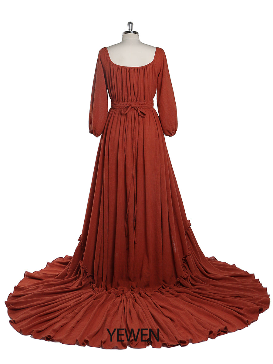 Back view of rust boho maternity photoshoot dress designed for baby shower and maternity photography sessions