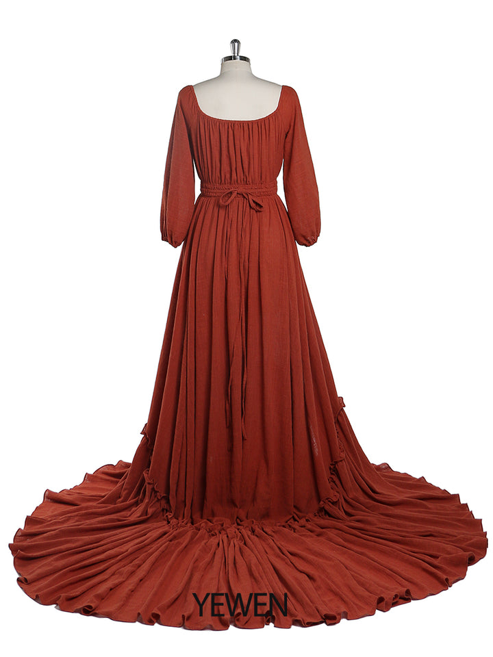 Back view of rust boho maternity photoshoot dress designed for baby shower and maternity photography sessions