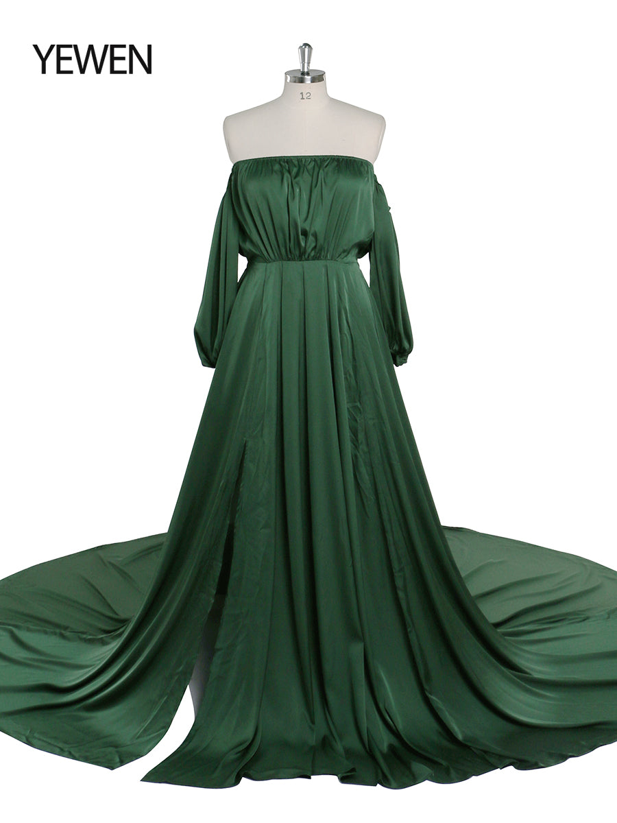 Back view of green satin pregnancy shooting dress designed for elegant evening maternity and baby shower photoshoot