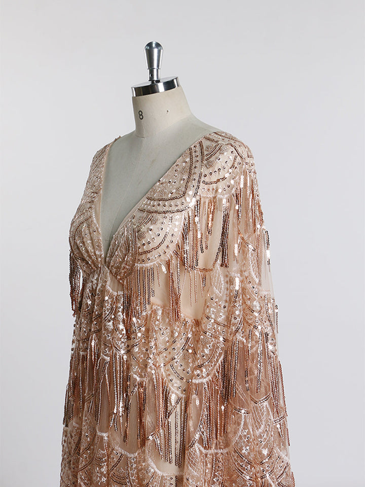 Close-up of sparkling sequin detail on maternity dress for photo shoot showing glamorous reflective texture