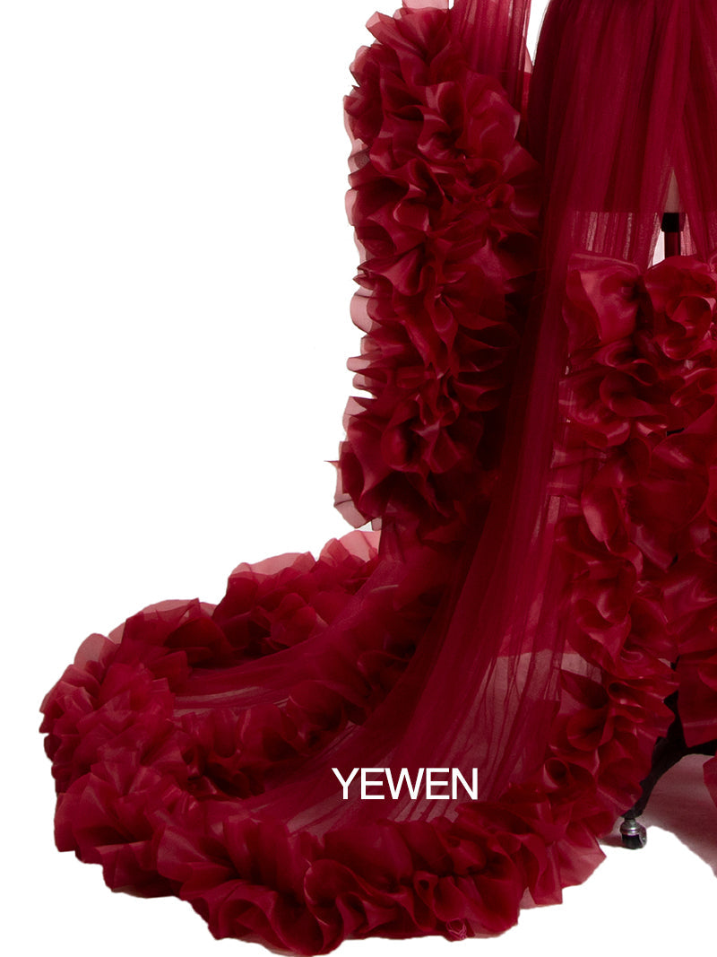 Close-up of ruffled fabric detail on sexy photoshoot dress showing elegant craftsmanship