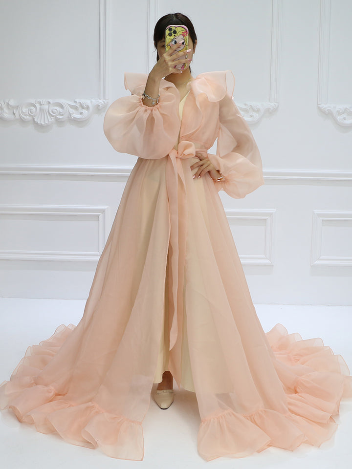 Elegant pink silk organza maternity dress for photo shoot with puffy sleeves designed for pregnancy photography and studio portraits