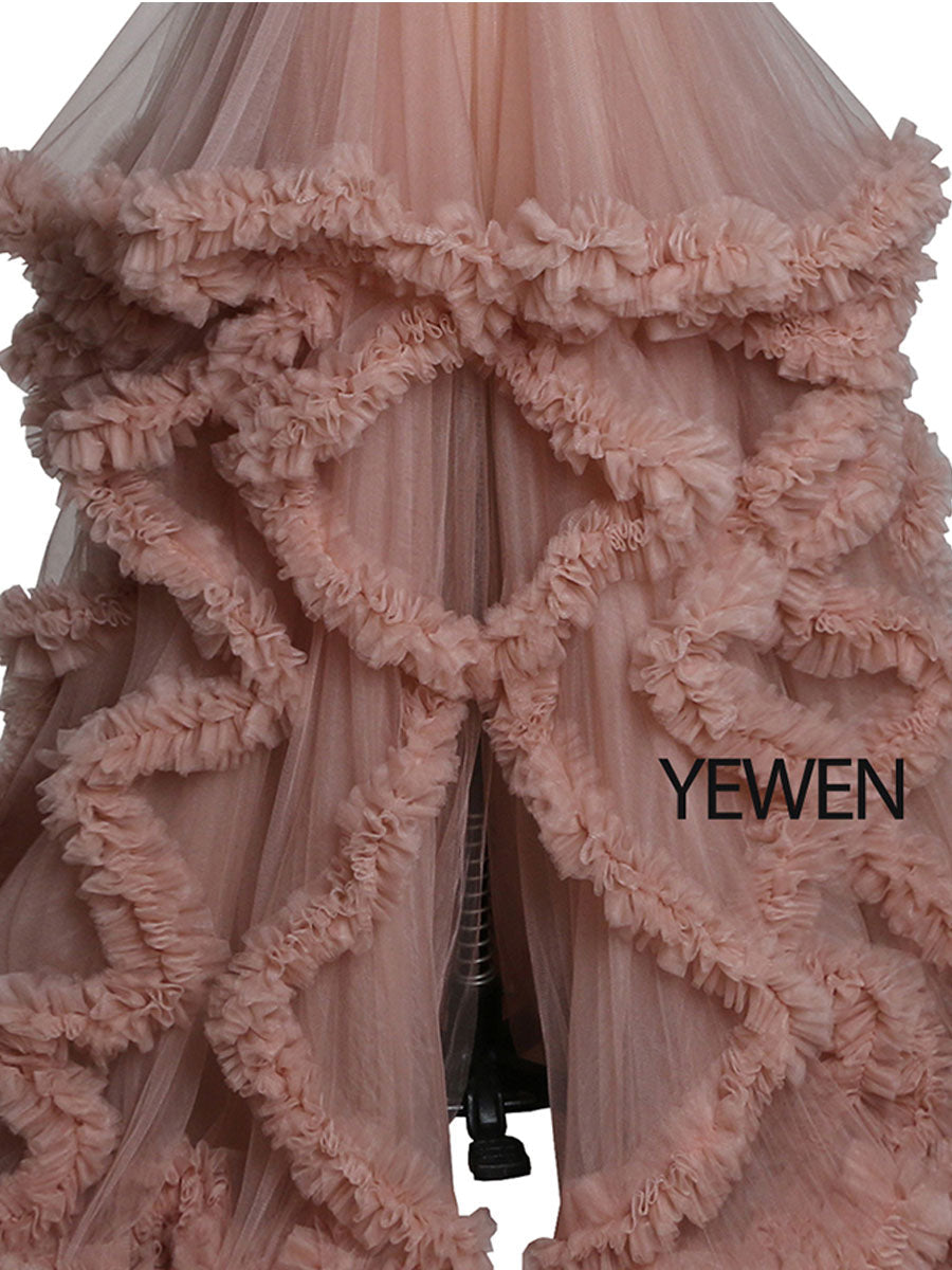 Close-up of ruffle detailing on sleeveless maternity dress for photoshoot showing soft elegant texture