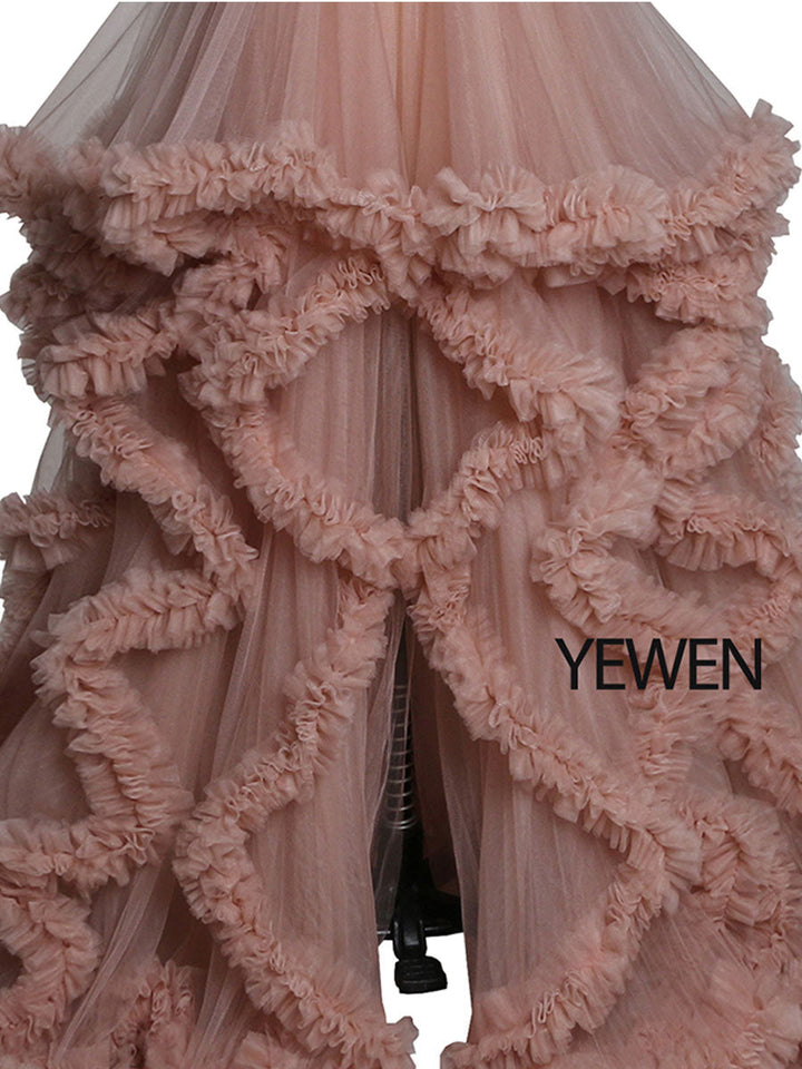 Close-up of ruffle detailing on sleeveless maternity dress for photoshoot showing soft elegant texture