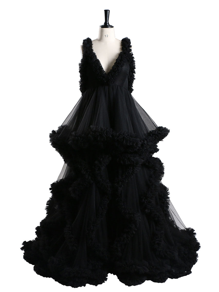 Elegant black sleeveless maternity dress for photoshoot with ruffle details designed for pregnancy photography and baby shower