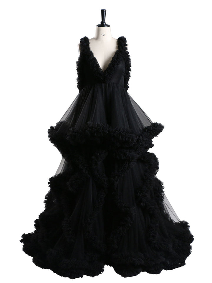 Elegant black sleeveless maternity dress for photoshoot with ruffle details designed for pregnancy photography and baby shower