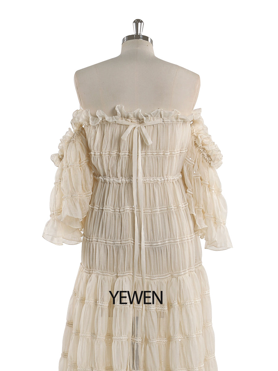 Back view of summer beach dress for photo shoot with off shoulder boho design for coastal photography