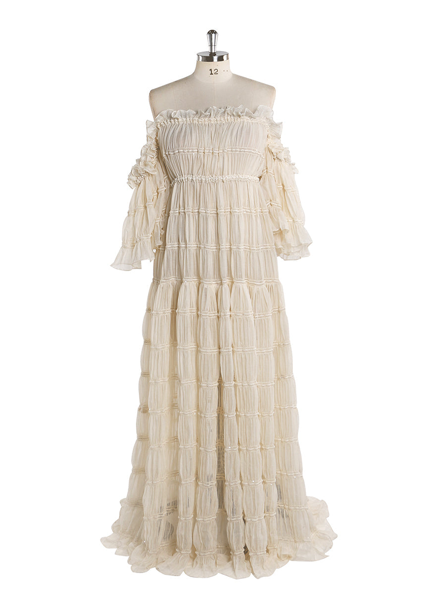 Front view of summer beach dress for photo shoot with off shoulder design and boho silhouette