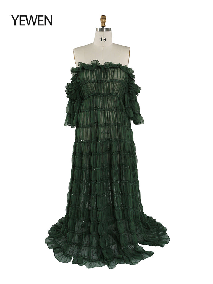 Elegant off shoulder green boho summer beach dress designed for photoshoot with side slit for flowing coastal photography