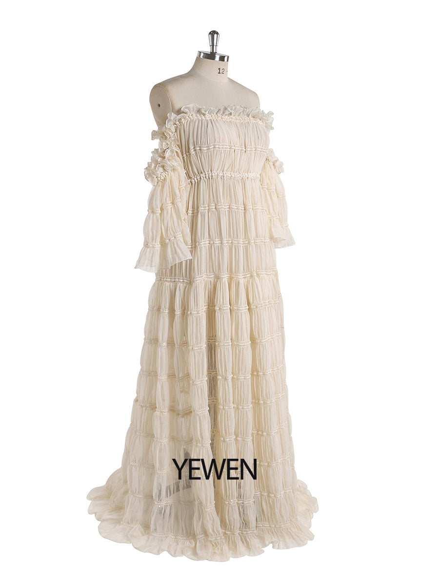 Side view of summer beach dress for photo shoot showing elegant slit design and flowing beach gown movement