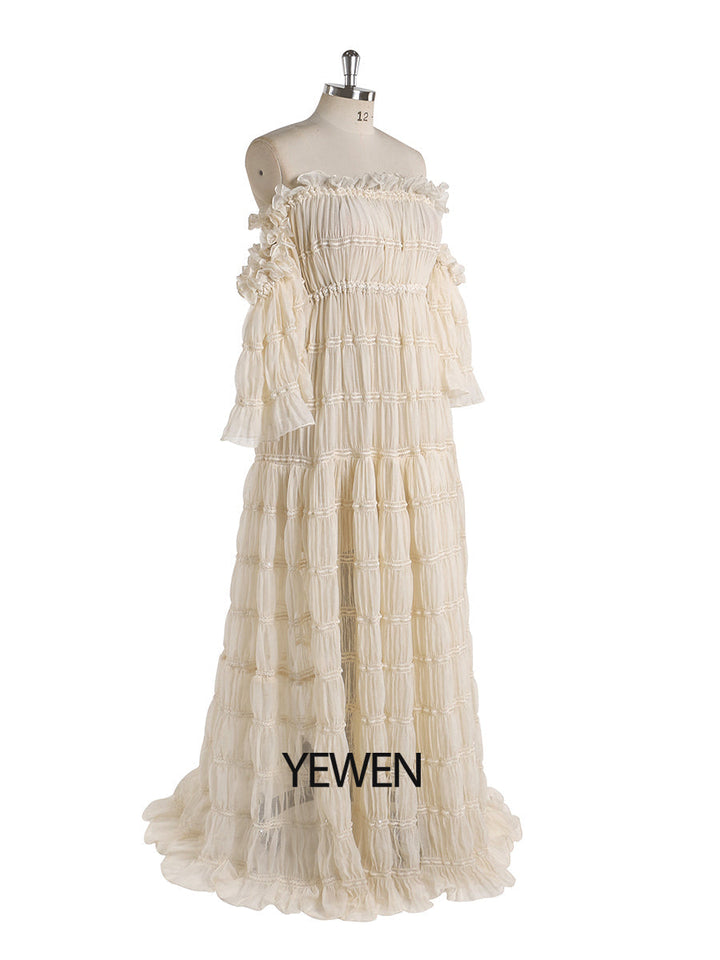 Side view of summer beach dress for photo shoot showing elegant slit design and flowing beach gown movement