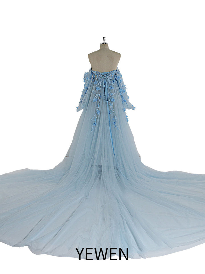 Back view of blue tulle maternity photoshoot dress with floral lace detailing designed for wedding guest and photoshoot