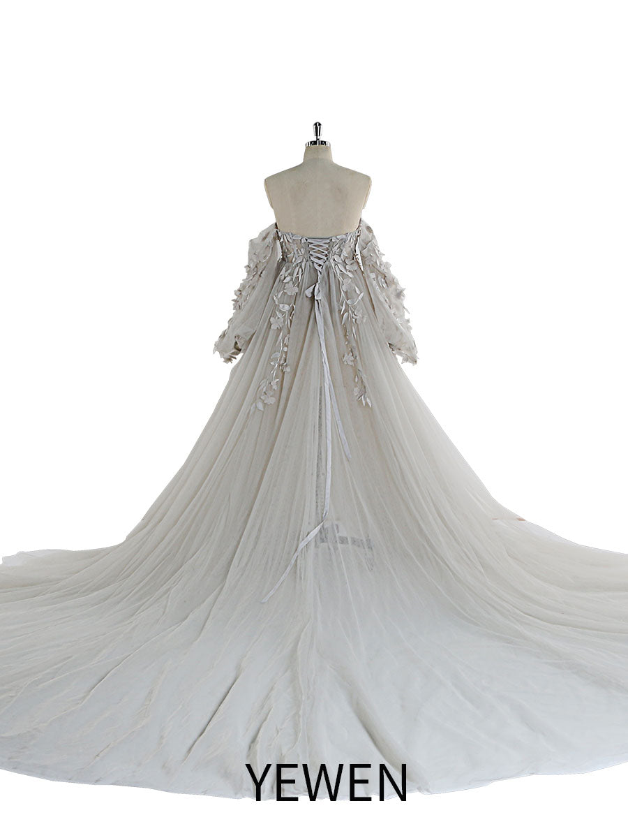Back view of white tulle maternity photoshoot dress with floral lace detailing designed for wedding guest and photoshoot