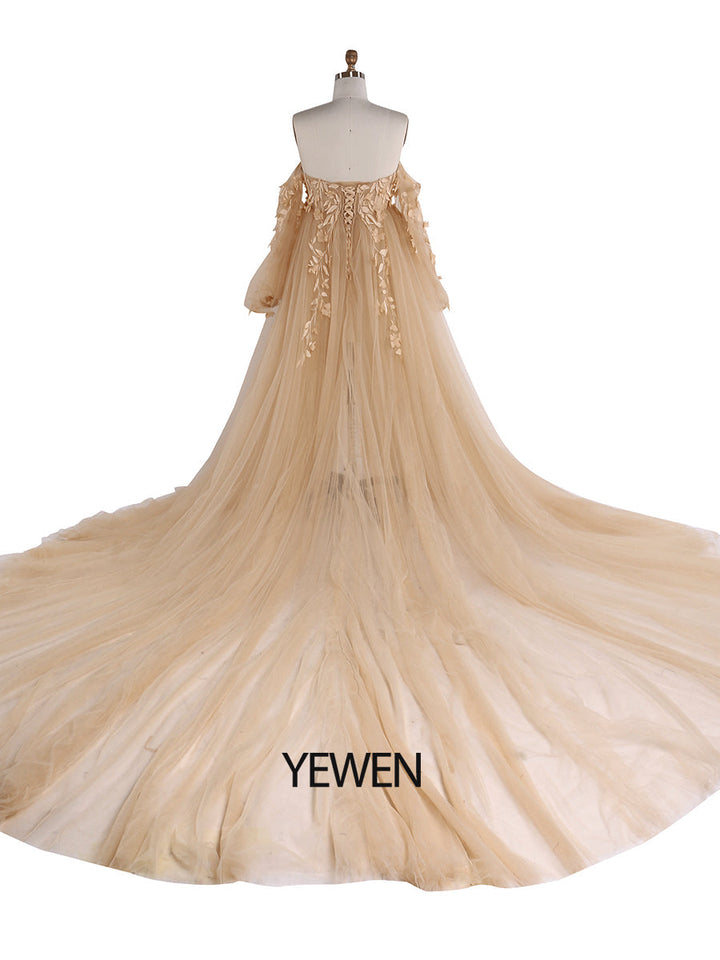 Back view of yellow tulle maternity photoshoot dress with floral lace detailing designed for wedding guest and photoshoot