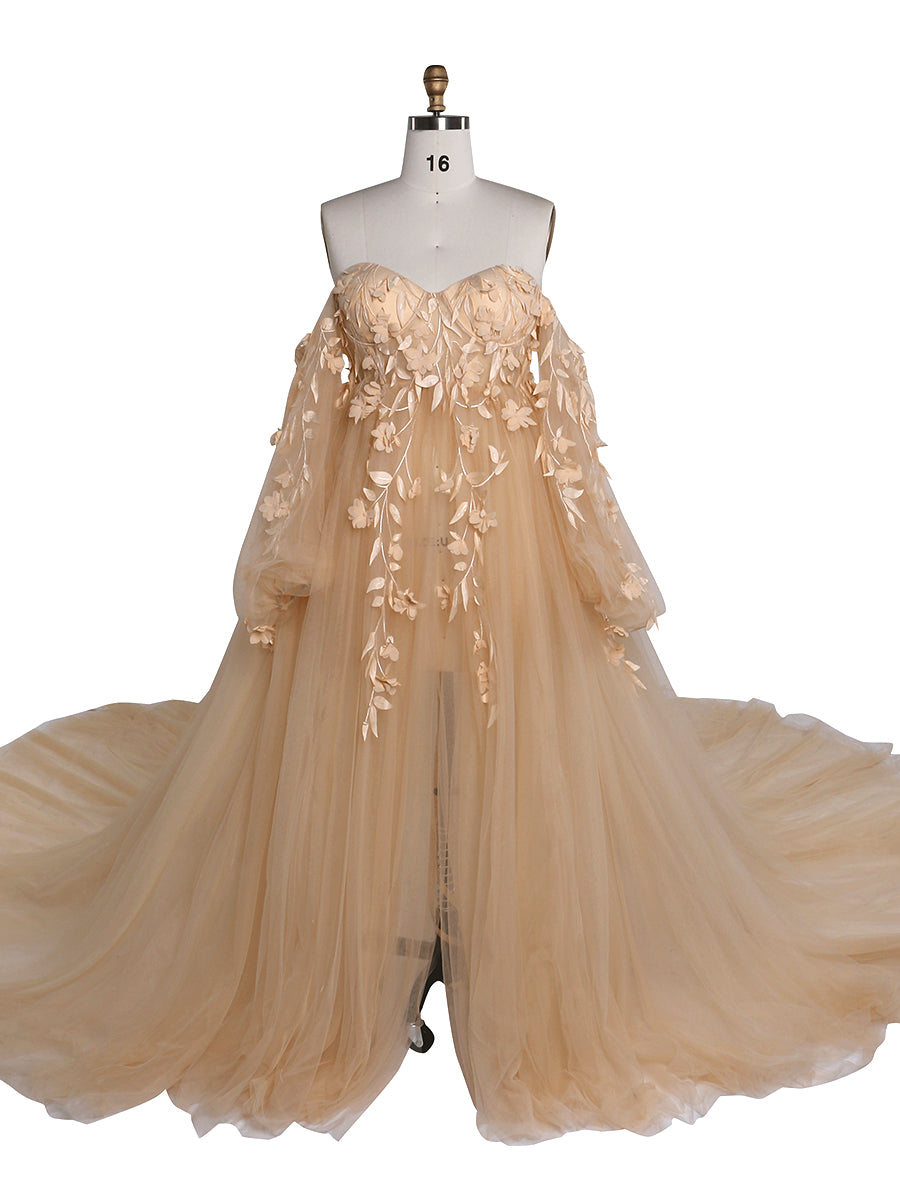 Front view of yellow tulle maternity photoshoot dress with long sleeves and floral lace detailing for elegant pregnancy photography