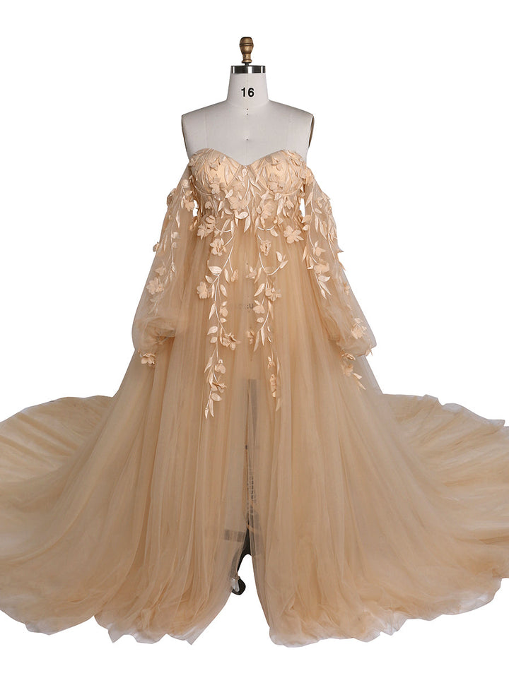Front view of yellow tulle maternity photoshoot dress with long sleeves and floral lace detailing for elegant pregnancy photography