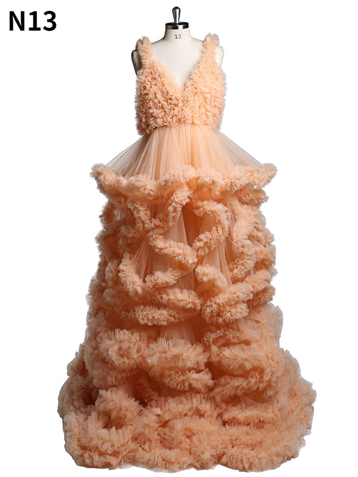 Backless orange tulle photoshoot dress with elegant ruffle layers designed for maternity photography