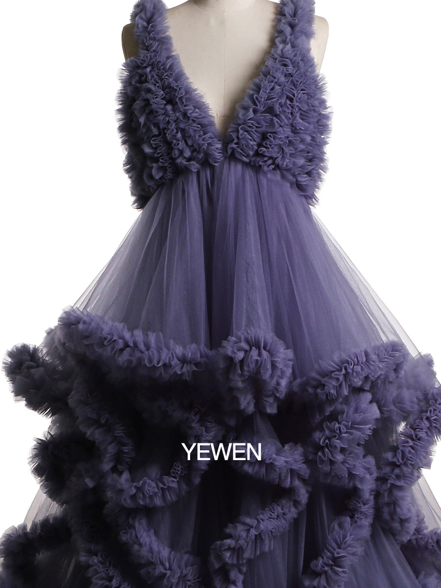 Close-up of soft tulle fabric and cloud-like ruffle details on maternity photoshoot dress