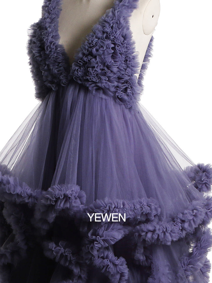 Close-up of soft tulle fabric and cloud-like ruffle details on photoshoot dress