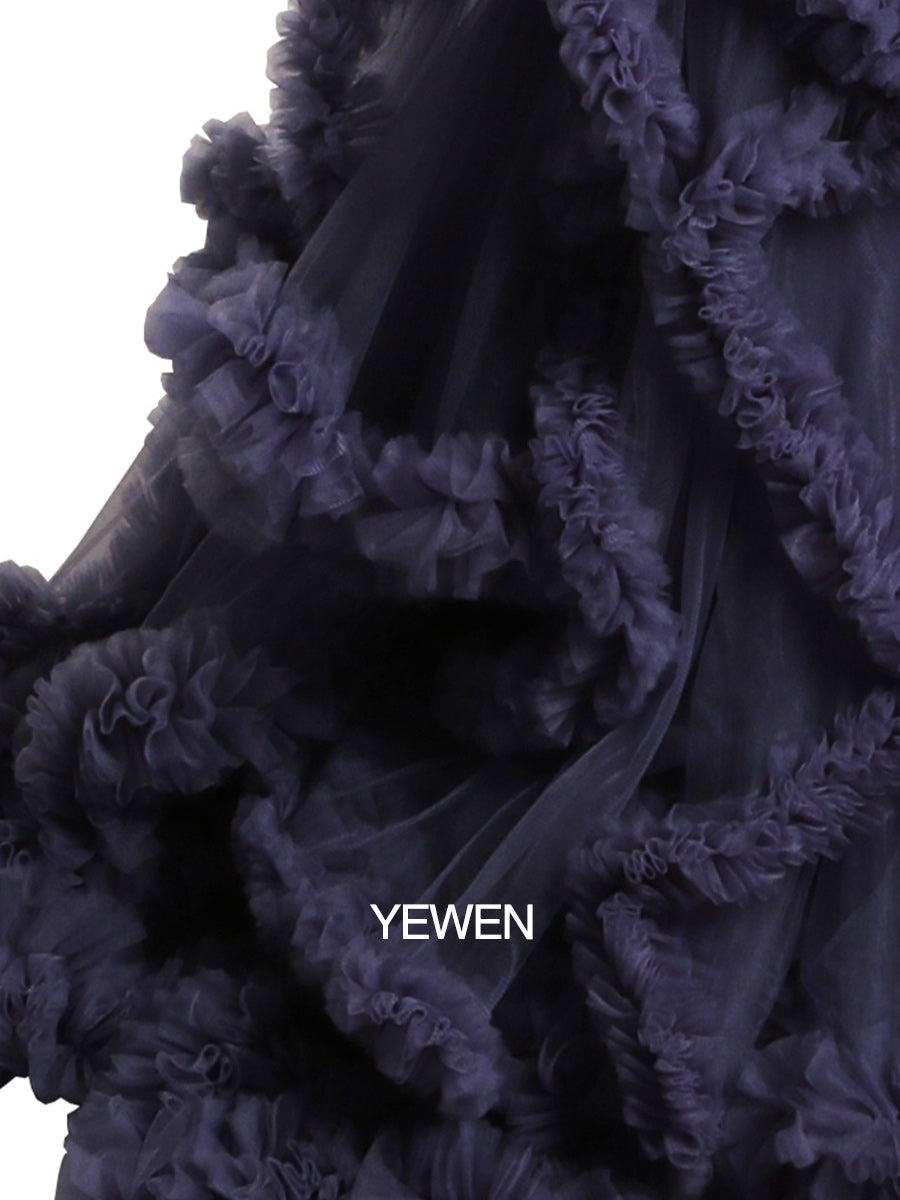 Close-up of soft tulle fabric and cloud-like ruffle details