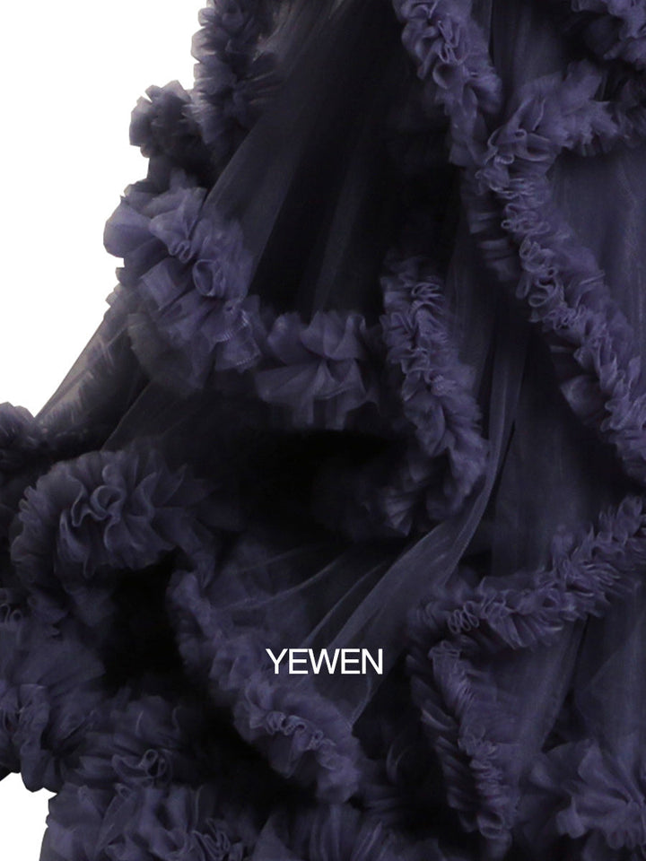 Close-up of soft tulle fabric and cloud-like ruffle details