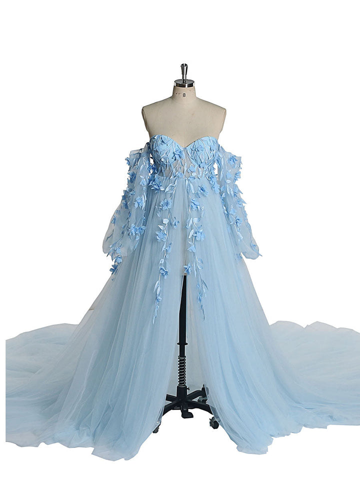 Front view of blue tulle maternity photoshoot dress with long sleeves and floral lace detailing for elegant pregnancy photography